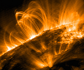 Ultraviolet emission from plasma in the Sun's atmosphere, revealing the complex magnetic field structures around active regions. Solar Orbiter will test theories of solar wind plasma emerging from such regions. (TRACE image)